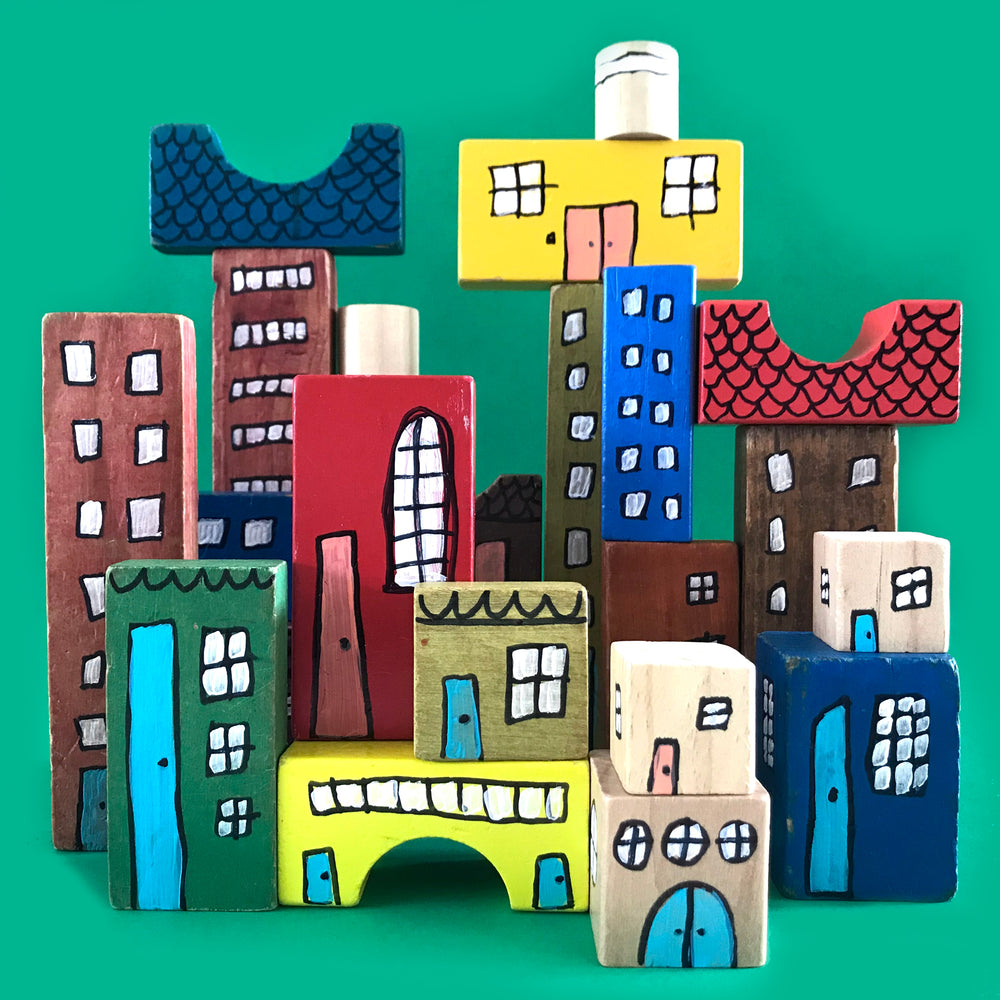 Wooden building blocks decorated to make buildings