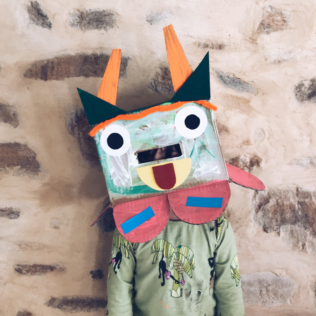 Cardboard box monster mask heads children's craft activity