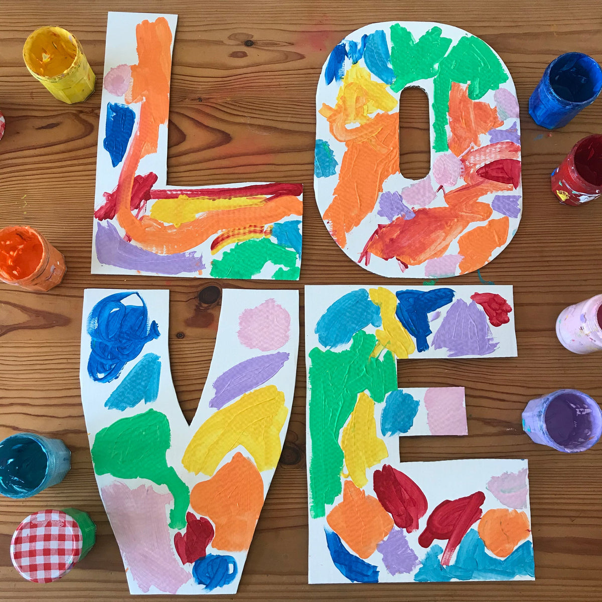 Kids painted large letters