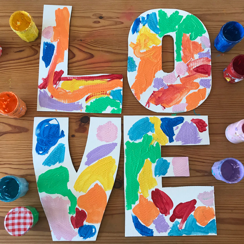 Kids painted large letters