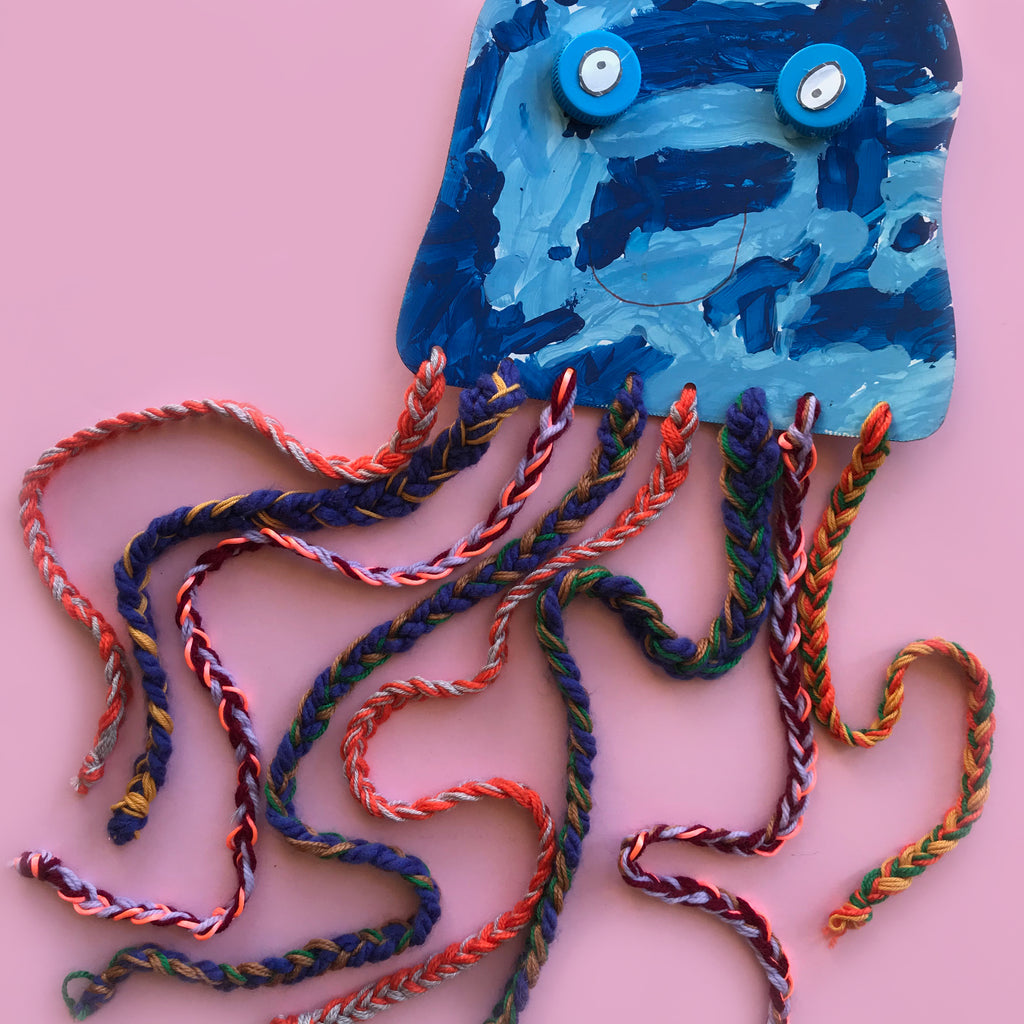 Painted jelly fish with paited yarn tentacles kids craft