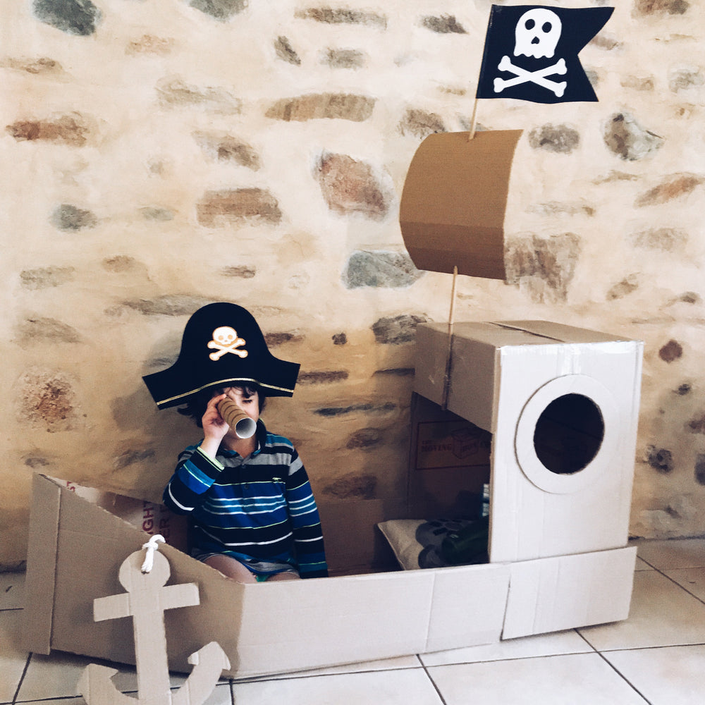 Up-cycled cardboard box pirate ship for dramatic play