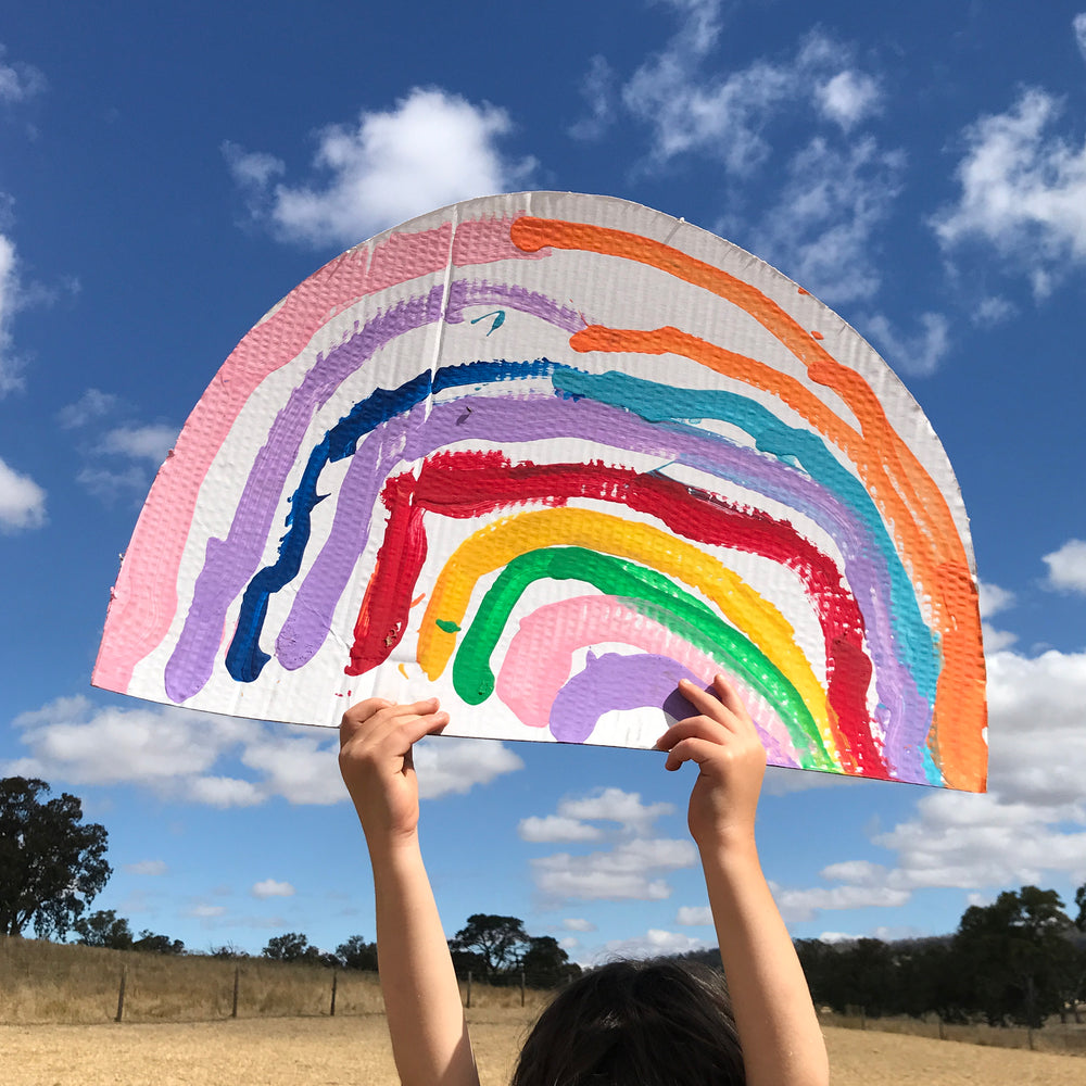 a large painted rainbow kids art project