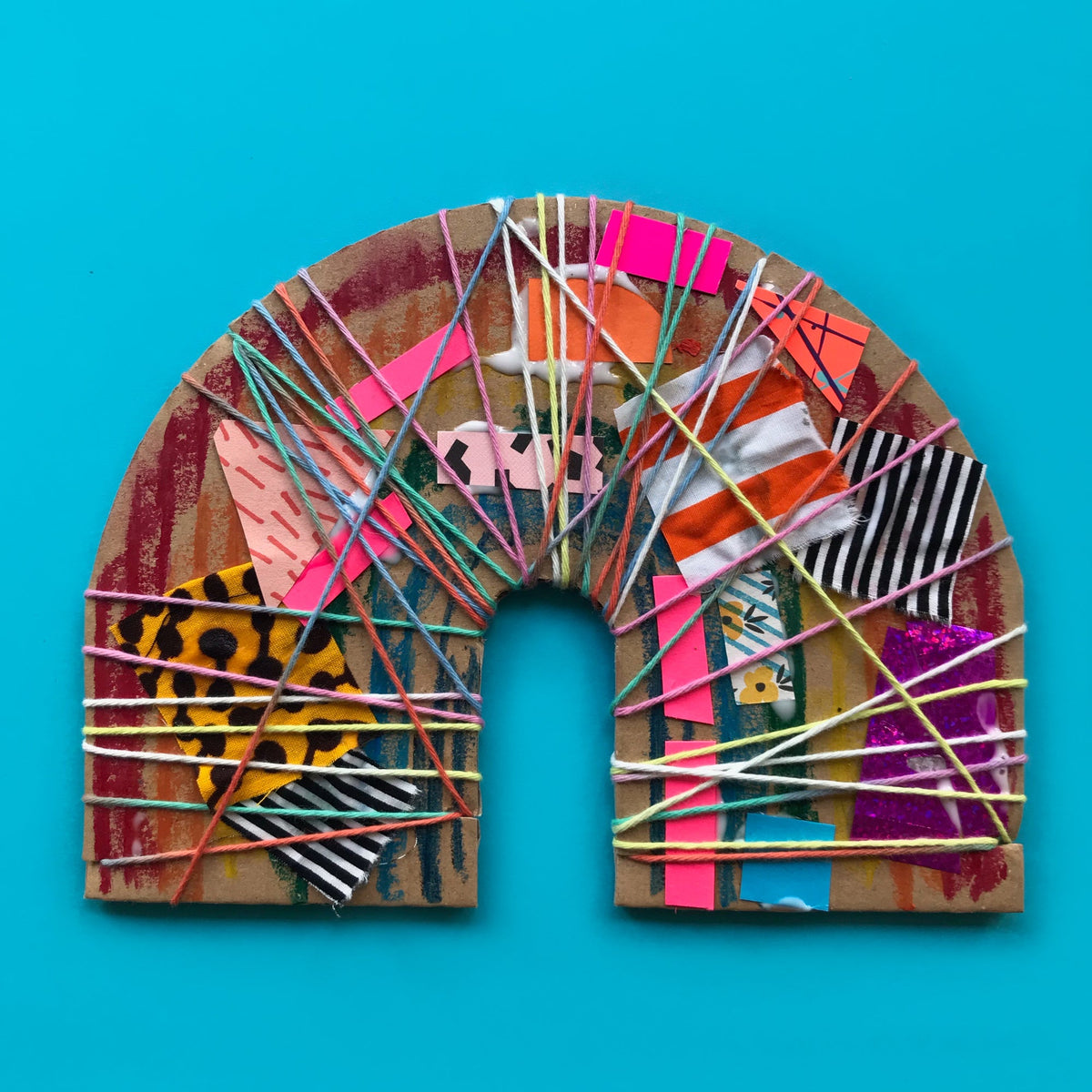 colourful yarn wrapped collage rainbow kids art project