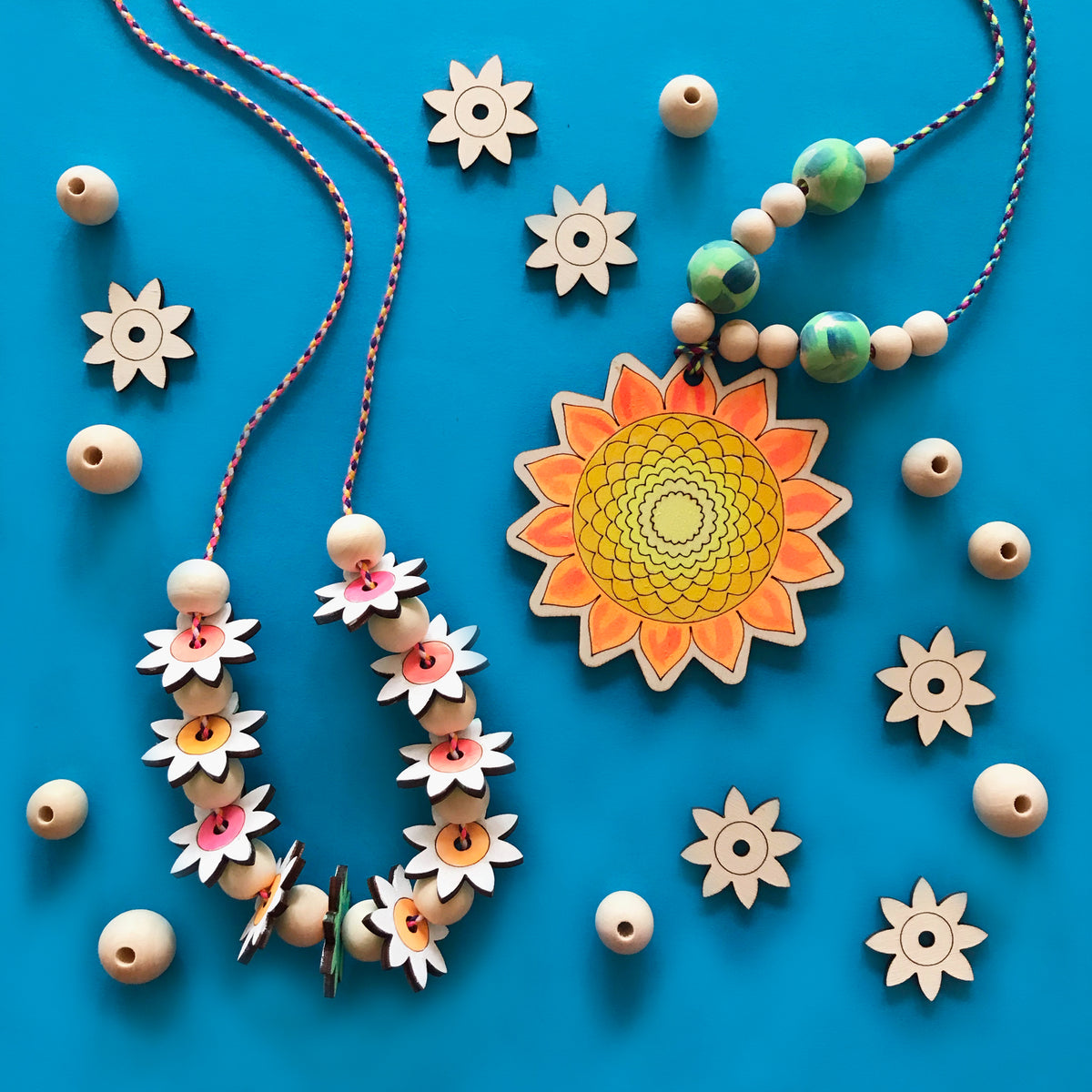 https://minimadthings.com/cdn/shop/products/sunflower-necklace-kit-1_1200x1200.jpg?v=1642322859